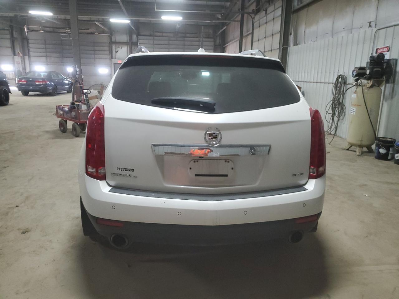 2012 Cadillac SRX VIN 3GYFNEE3XCS642132 Copart auction photo, front end / side damage thumbnail 6