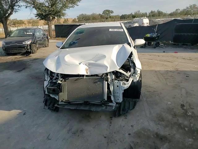 2021 Toyota Corolla VIN 5YFEPMAE2MP149167 Copart auction photo, front end / side damage thumbnail 10
