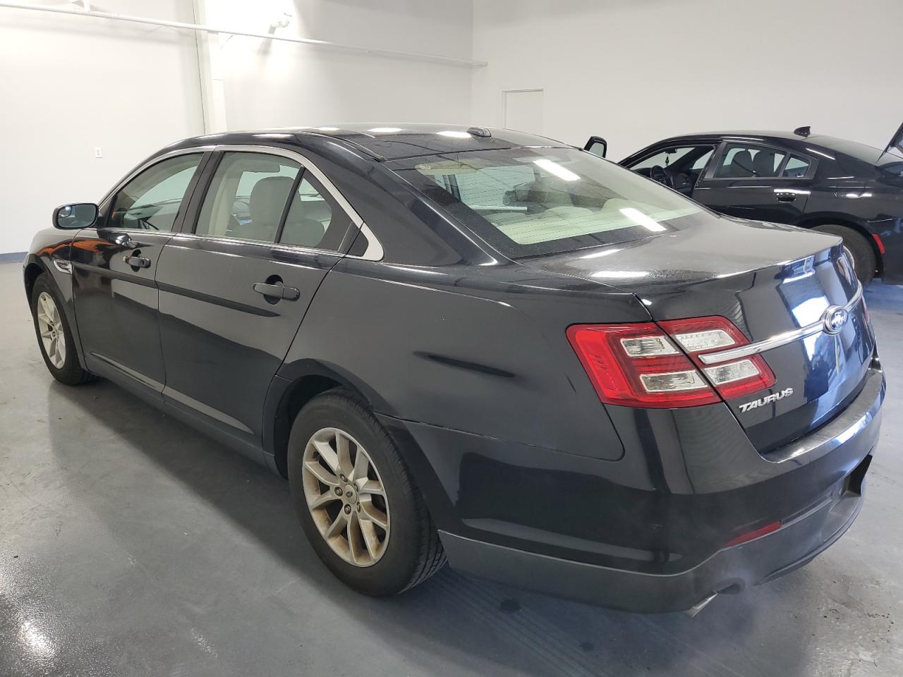 2014 Ford Taurus VIN 1FAHP2D89EG150719 Copart auction photo, normal wear damage thumbnail 2