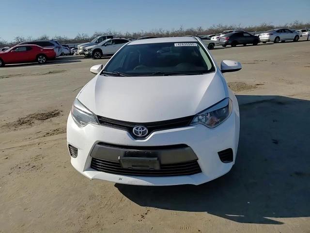 2016 Toyota Corolla VIN 5YFBURHE0GP524508 Copart auction photo, side / rear end damage thumbnail 11
