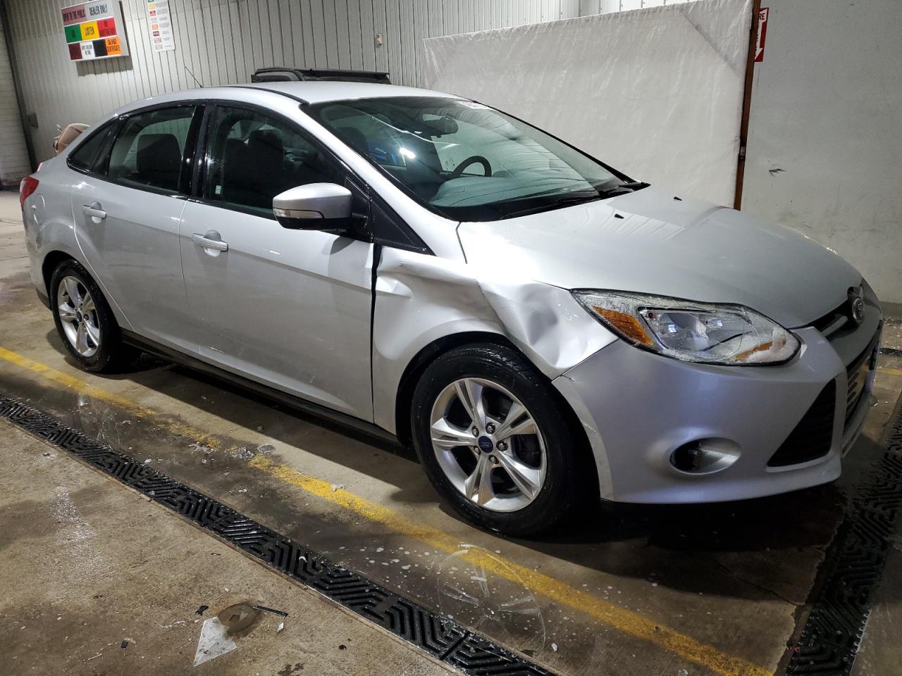 2014 Ford Focus VIN 1FADP3F2XEL252857 Copart auction photo, side damage thumbnail 4