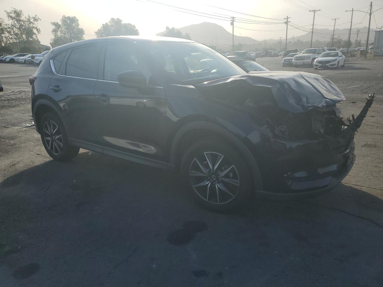 2018 Mazda CX-5 VIN JM3KFACM9J1420709 Copart auction photo, front end damage thumbnail 4
