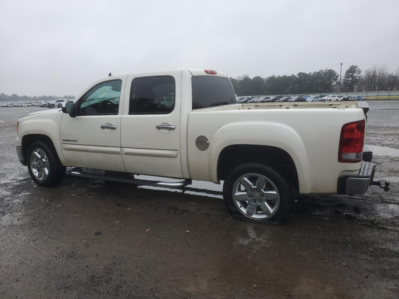 2012 GMC Sierra VIN 3GTP1VE02CG306876 Copart auction photo, undercarriage / minor dent/scratches damage thumbnail 2