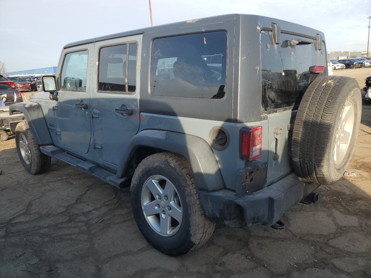 2015 Jeep Wrangler VIN 1C4BJWDG7FL638656 Copart auction photo, rear end / undercarriage damage thumbnail 2
