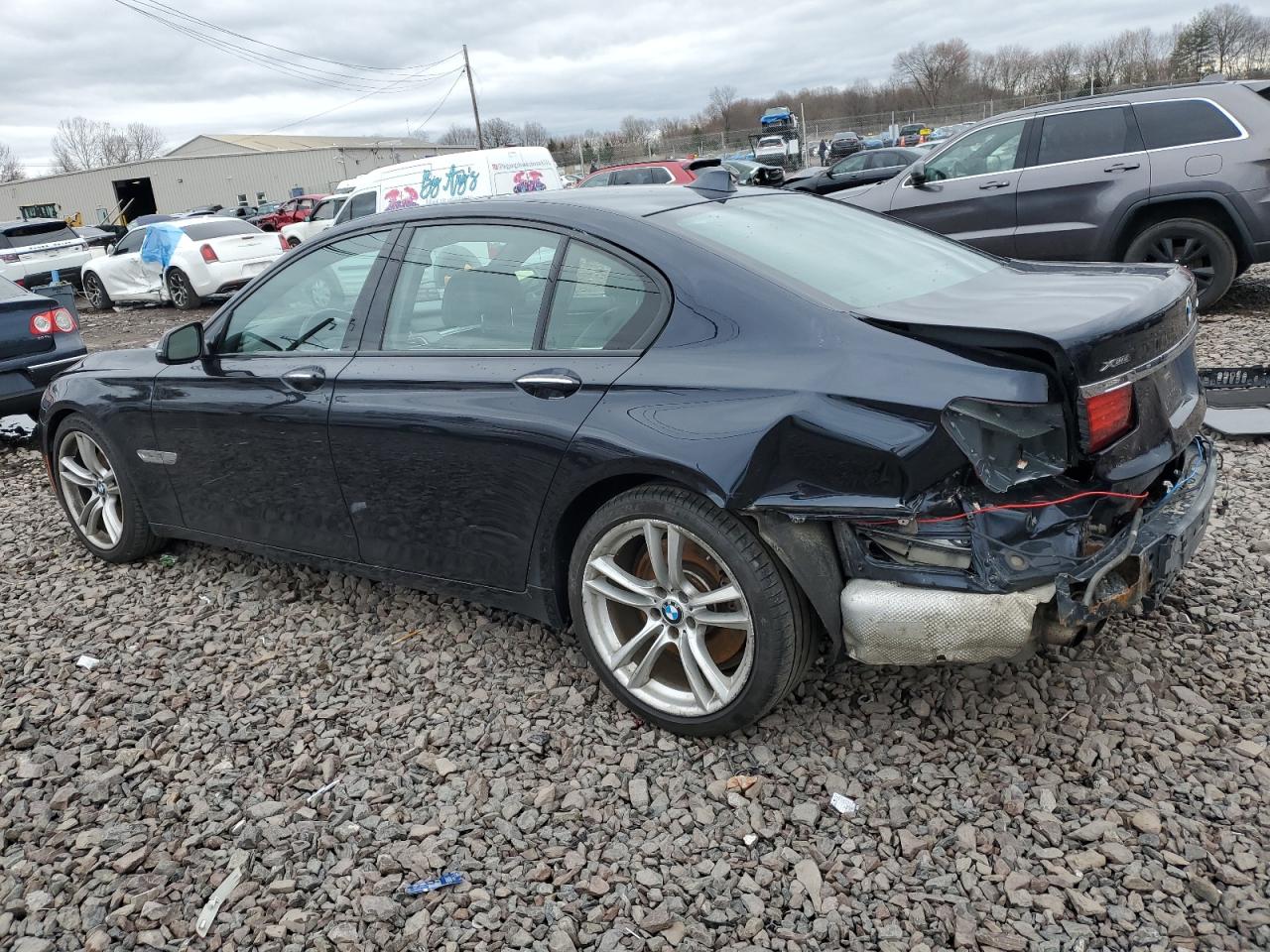 2015 BMW 7er VIN WBAYB6C56FD965841 Copart auction photo, rear end damage thumbnail 2