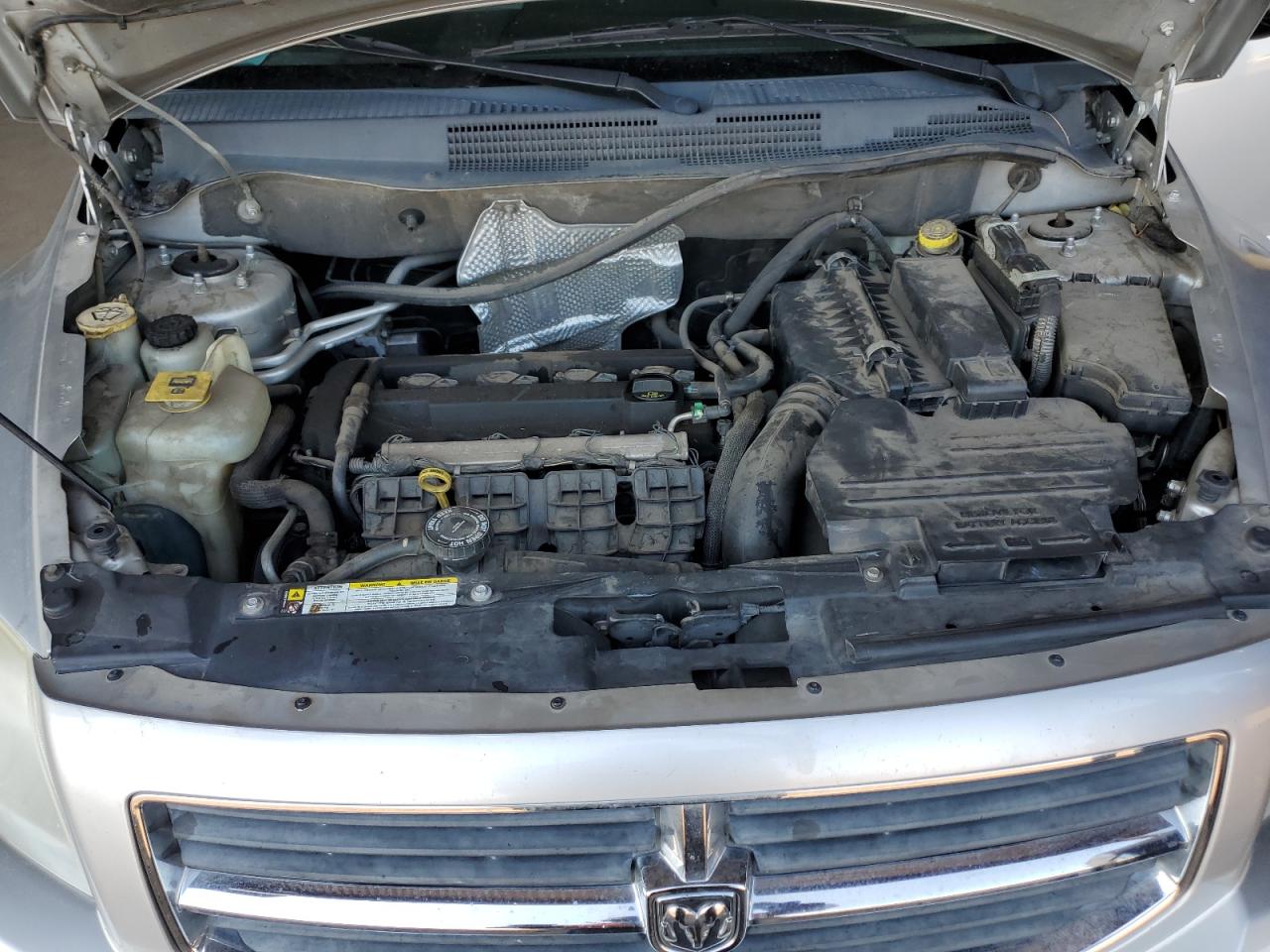 2009 Dodge Caliber VIN 1B3HB48A69D157699 Copart auction photo, vandalism / side damage thumbnail 11