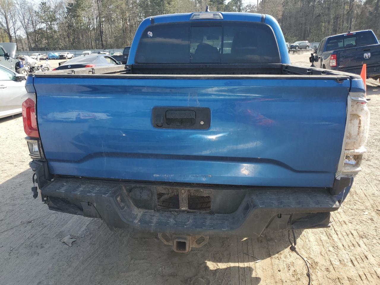 2017 Toyota Tacoma VIN 3TMGZ5AN0HM061076 Copart auction photo, undercarriage / minor dent/scratches damage thumbnail 6
