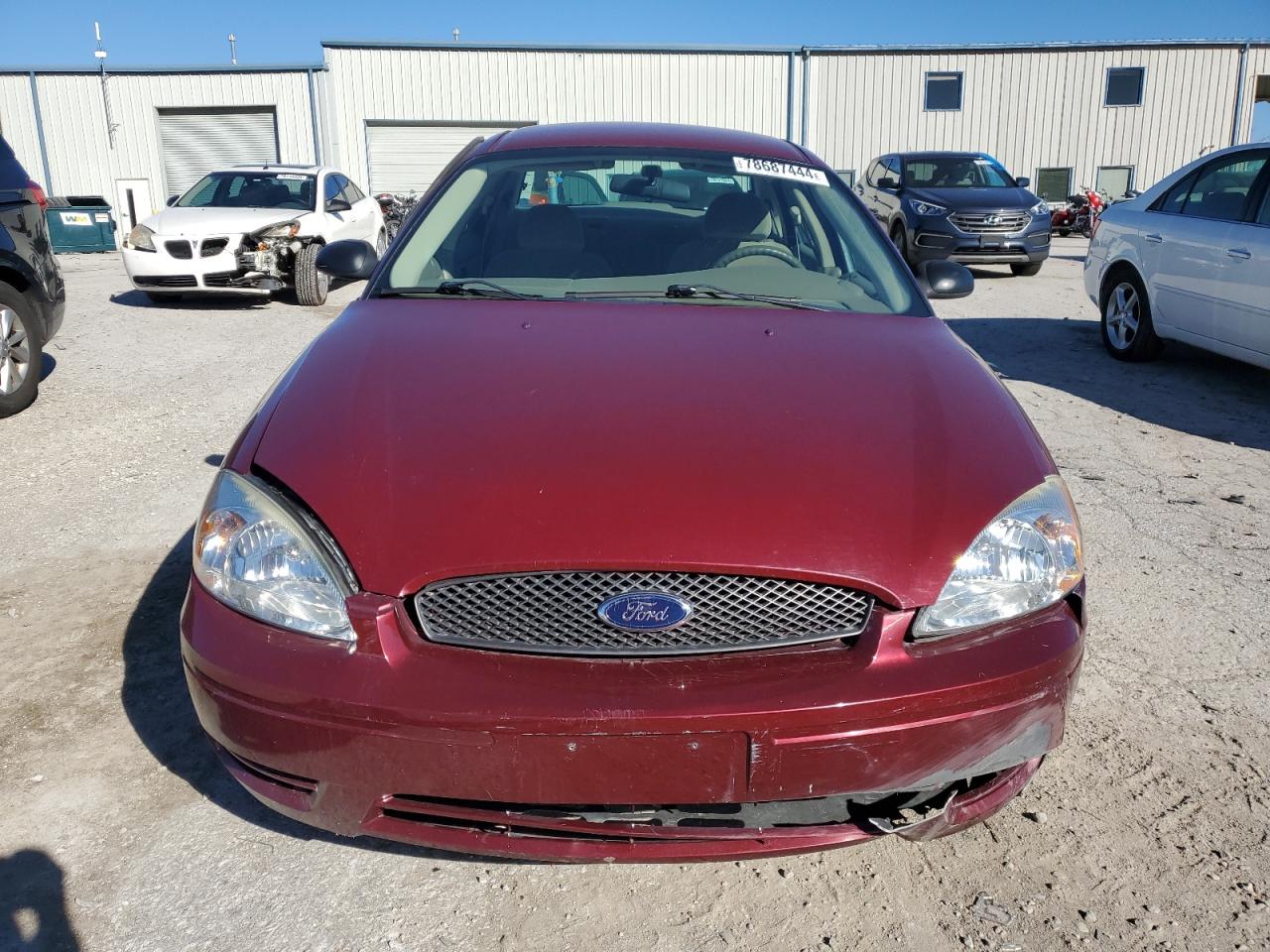 2004 Ford Taurus VIN 1FAFP552X4G198263 Copart auction photo, front end damage thumbnail 5
