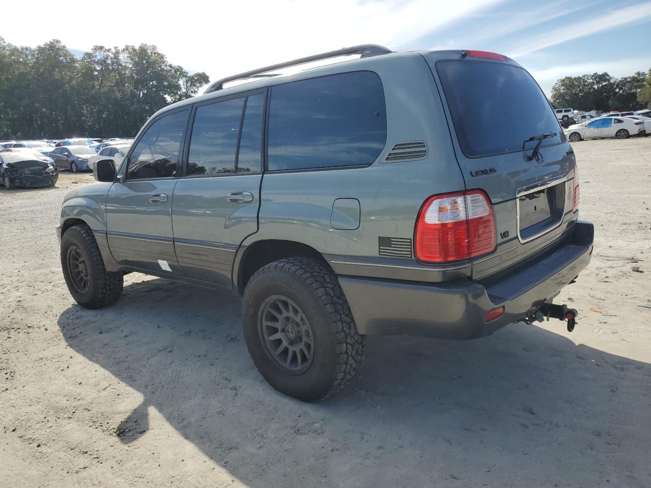 2002 Lexus LX VIN JTJHT00W723514716 Copart auction photo, water/flood damage thumbnail 2