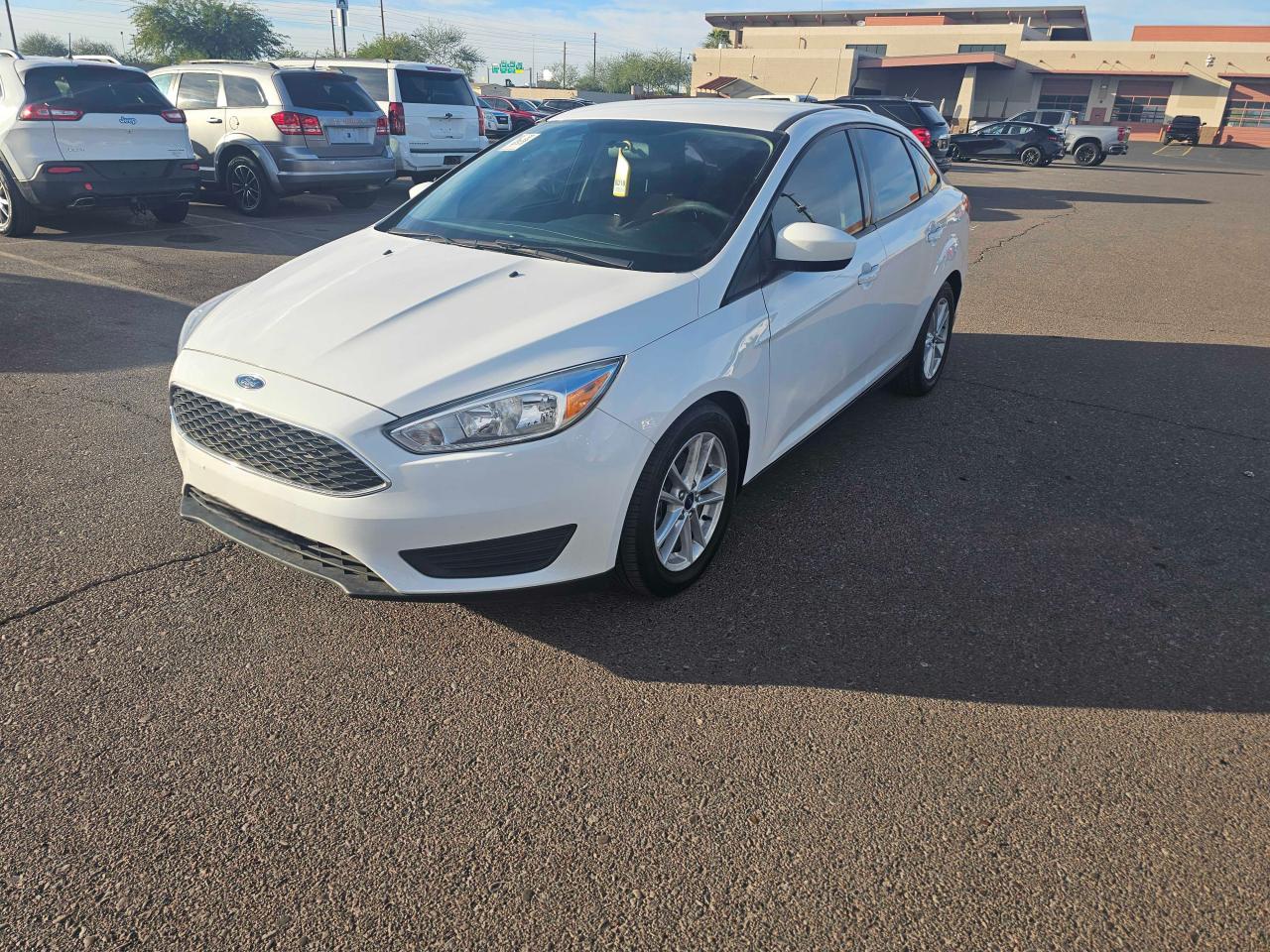 2018 Ford Focus VIN 1FADP3F21JL286180 Copart auction photo, normal wear / minor dent/scratches damage thumbnail 2
