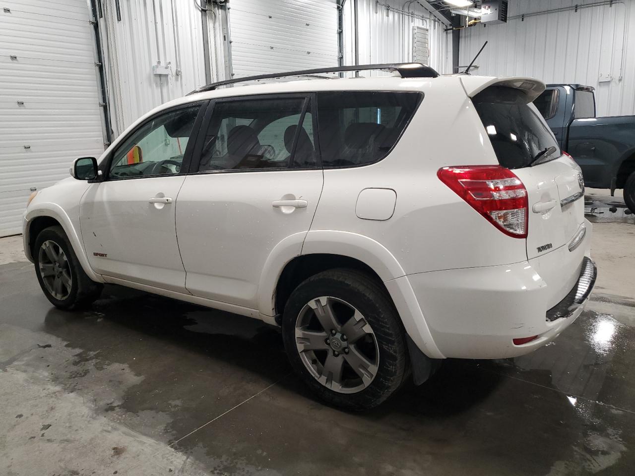 2010 Toyota RAV 4 VIN JTMRK4DV9A5096469 Copart auction photo, front end / rear end damage thumbnail 2