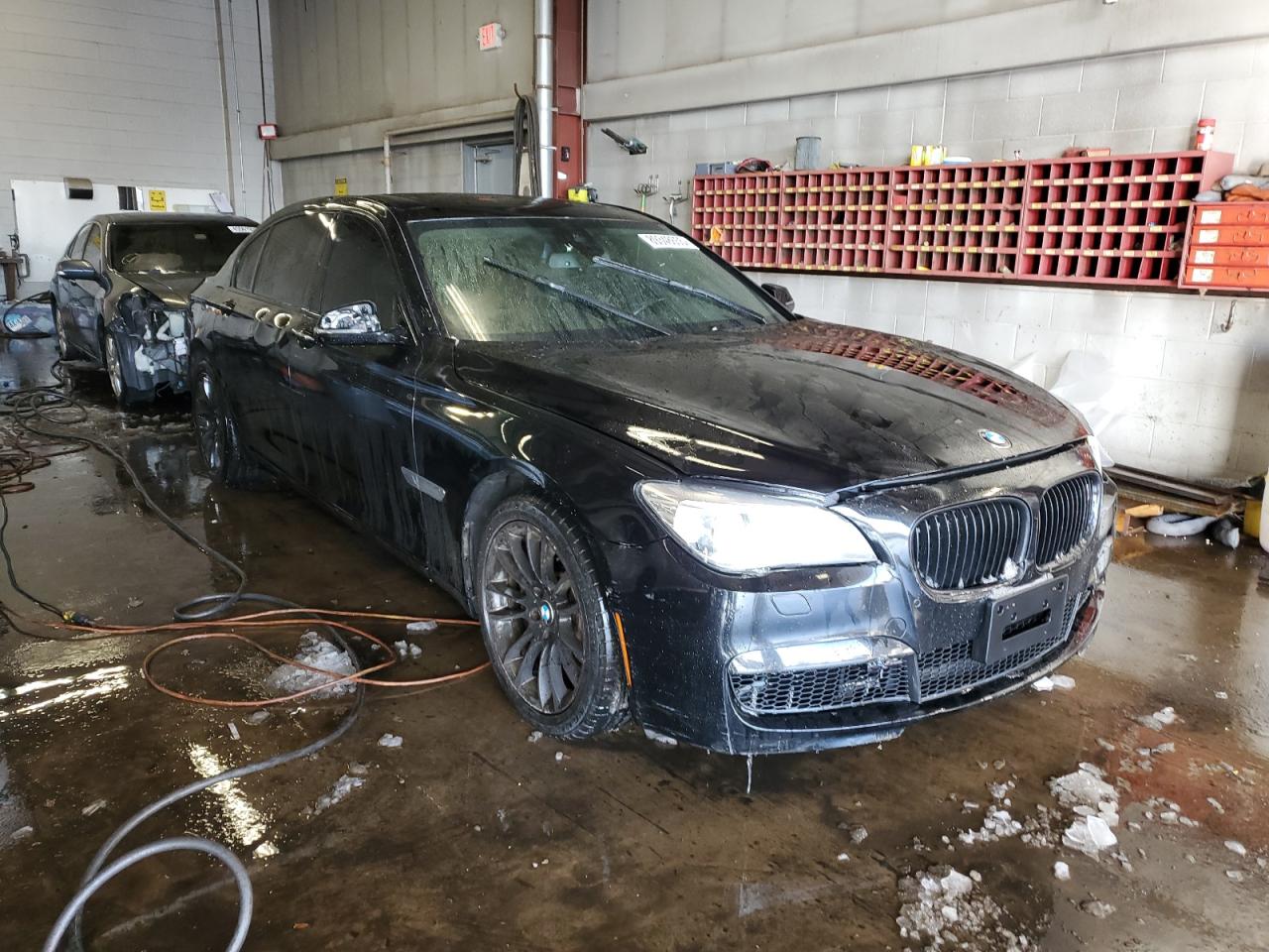 2014 BMW 7er VIN WBAYF8C59ED141718 Copart auction photo, front end / side damage thumbnail 4