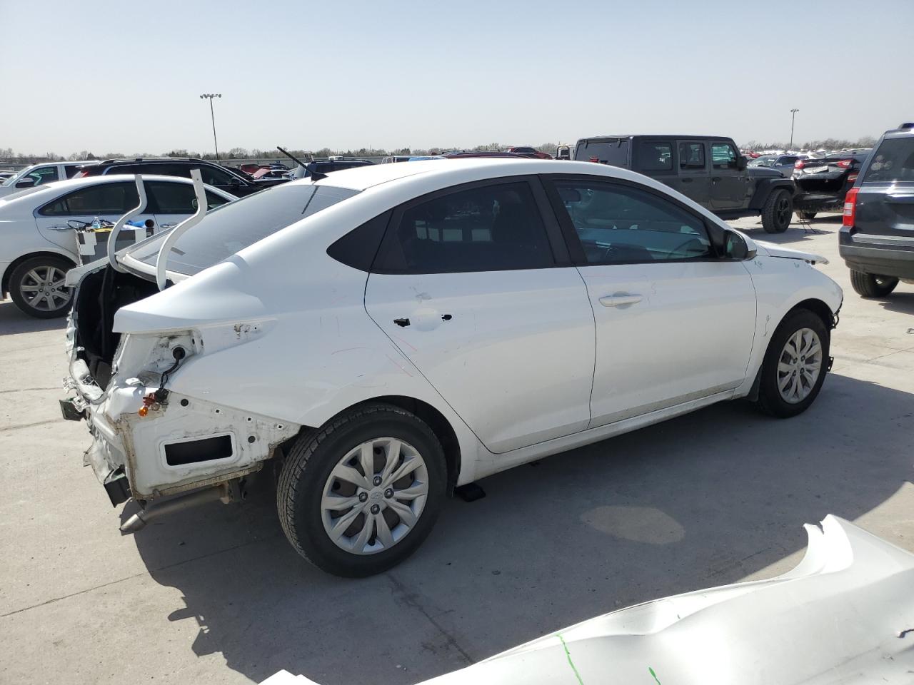 2018 Hyundai Accent VIN 3KPC24A33JE032375 Copart auction photo, rear end / hail damage thumbnail 3