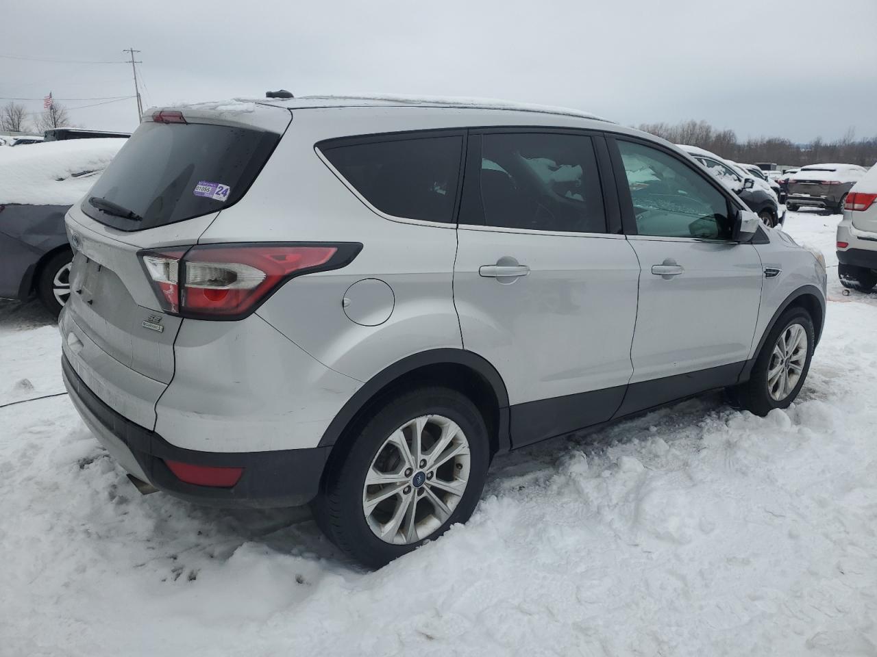 2017 Ford Escape VIN 1FMCU0GD9HUB38209 Copart auction photo, side damage thumbnail 3