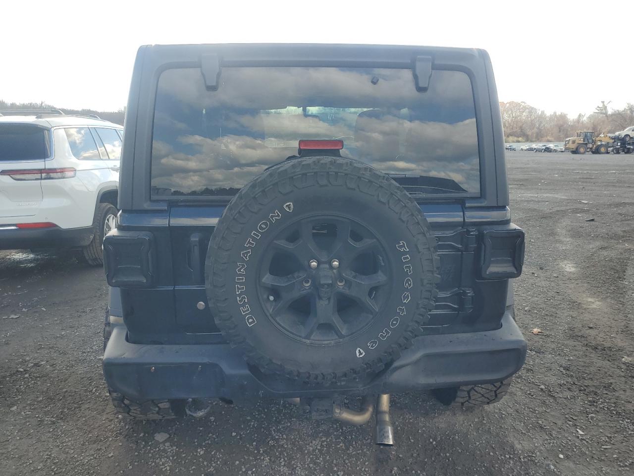 2020 Jeep Wrangler VIN 1C4GJXAN3LW245519 Copart auction photo, undercarriage / minor dent/scratches damage thumbnail 6
