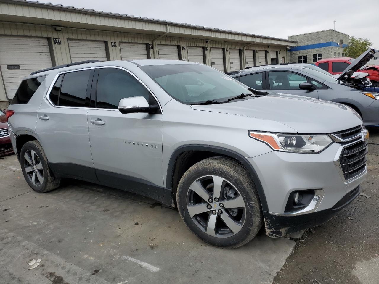 2021 Chevrolet Traverse VIN 1GNEVHKW3MJ154023 Copart auction photo, rear end / side damage thumbnail 4