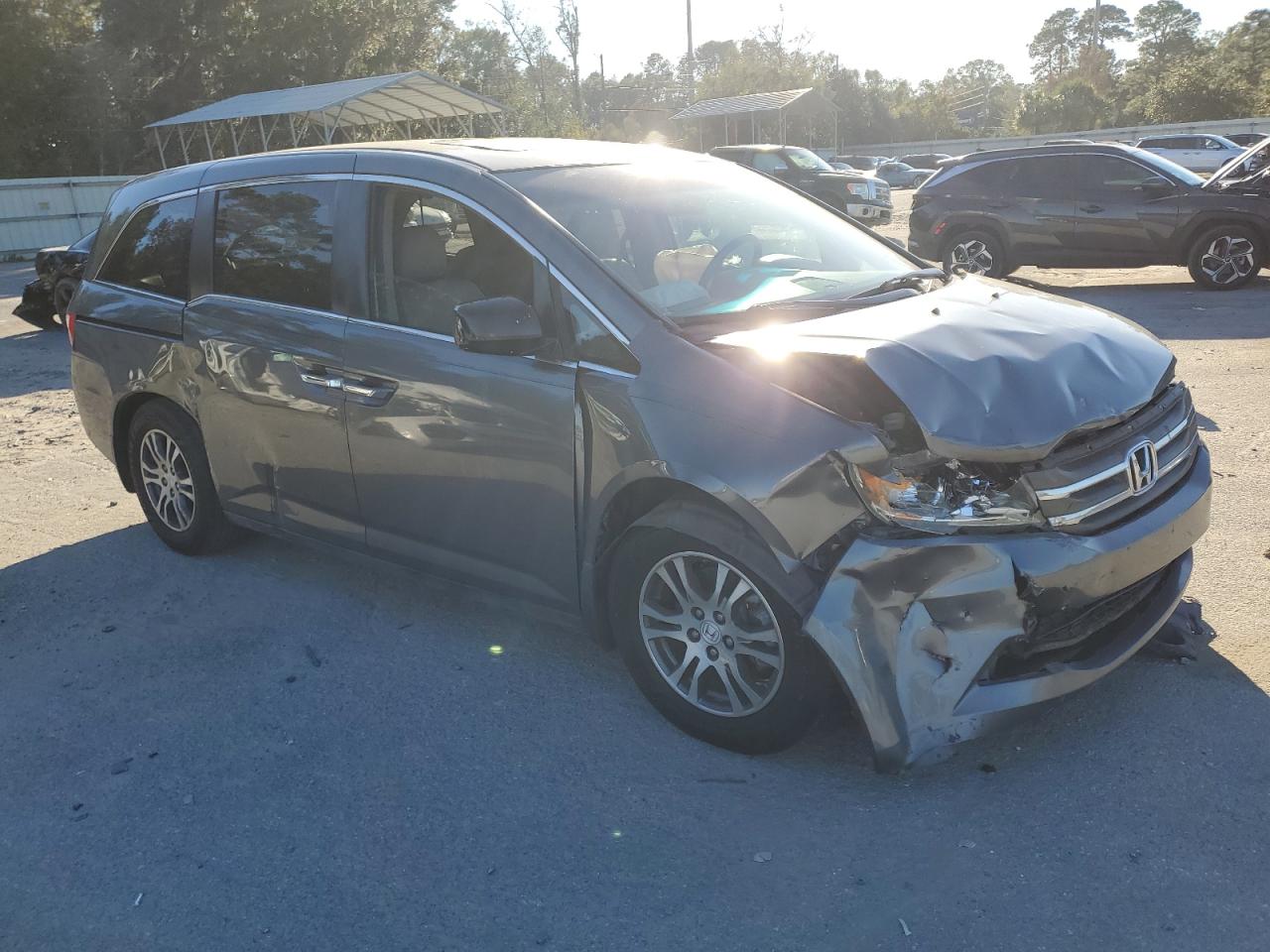 2012 Honda Odyssey VIN 5FNRL5H61CB087983 Copart auction photo, front end / side damage thumbnail 4