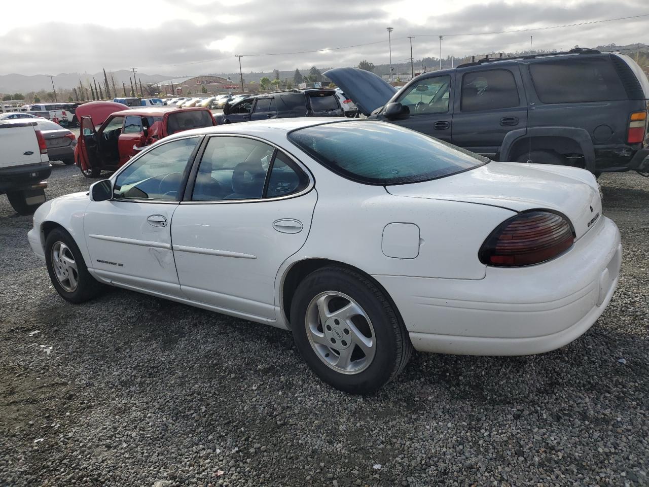 1999 Pontiac Grand Prix VIN 1G2WJ52MXXF213490 Copart auction photo, side damage thumbnail 2