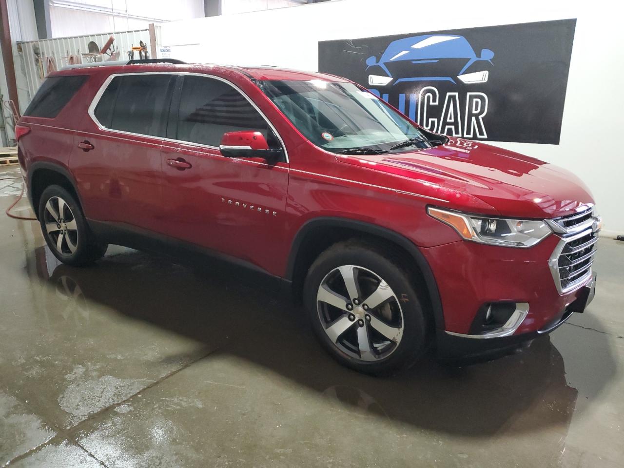 2018 Chevrolet Traverse VIN 1GNEVHKWXJJ107650 Copart auction photo, hail damage thumbnail 4