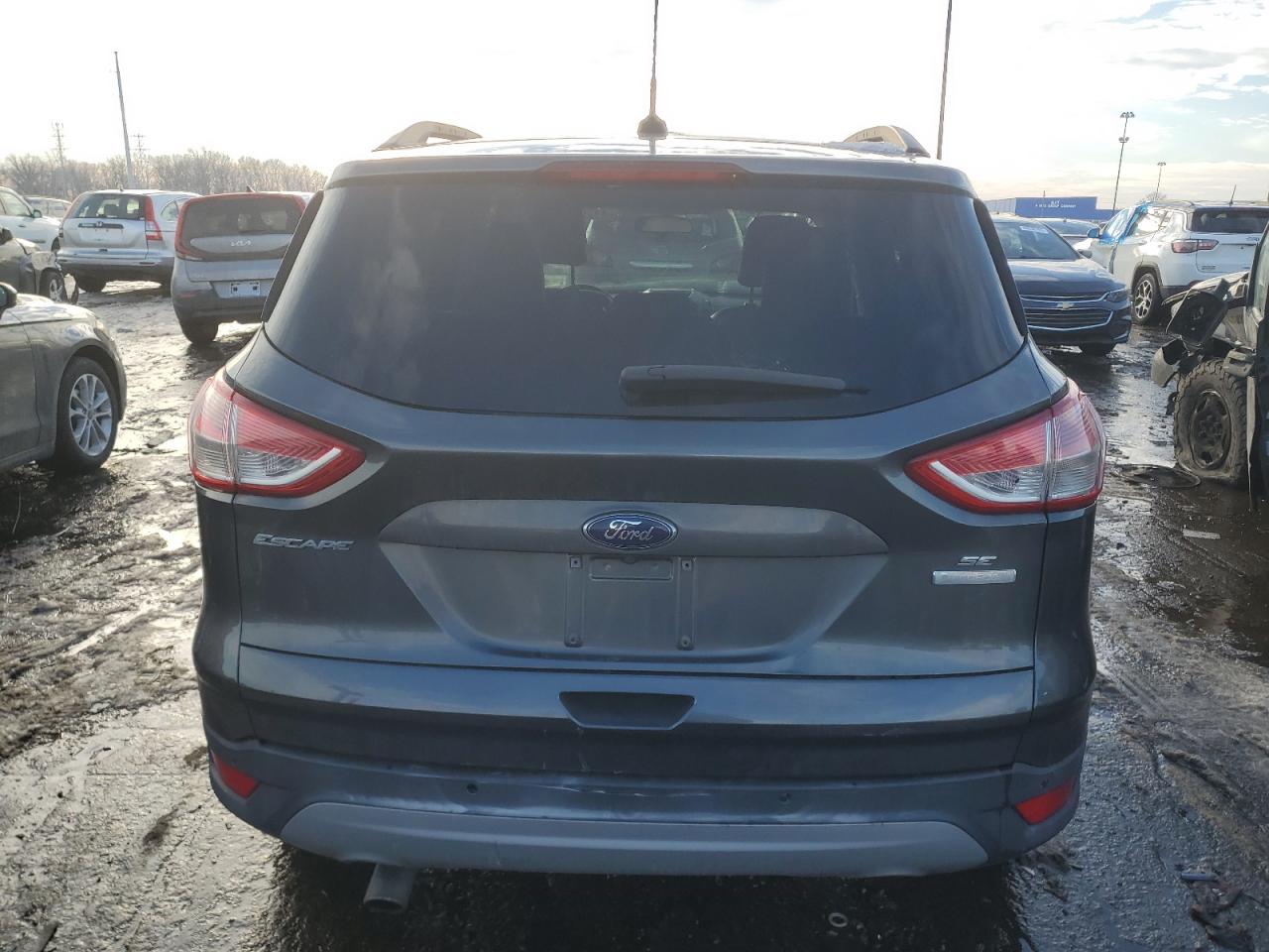 2016 Ford Escape VIN 1FMCU0G90GUC45966 Copart auction photo, rear end damage thumbnail 6