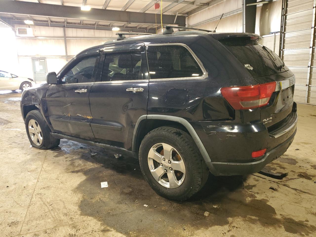 2011 Jeep Grand Cherokee VIN 1J4RR5GG3BC528804 Copart auction photo, side / front end damage thumbnail 2