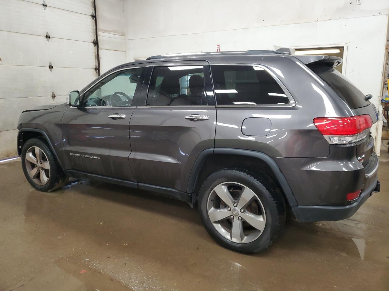 2015 Jeep Grand Cherokee VIN 1C4RJFBG8FC717884 Copart auction photo, front end / minor dent/scratches damage thumbnail 2