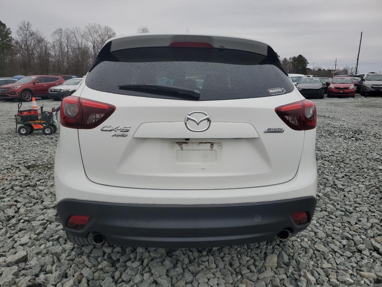 2016 Mazda CX-5 VIN JM3KE4DY3G0796990 Copart auction photo, all over damage thumbnail 6