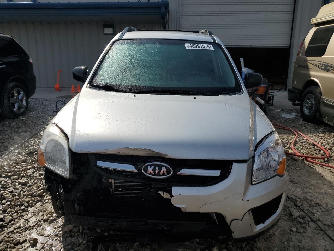 2010 KIA Sportage VIN KNDKG3A4XA7722754 Copart auction photo, front end damage thumbnail 5