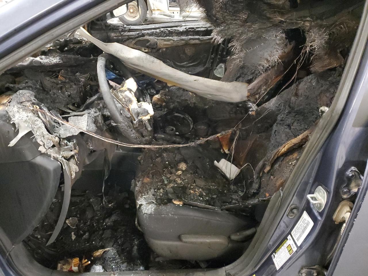 2009 Pontiac Vibe VIN 5Y2SM67039Z411455 Copart auction photo, burn damage thumbnail 7