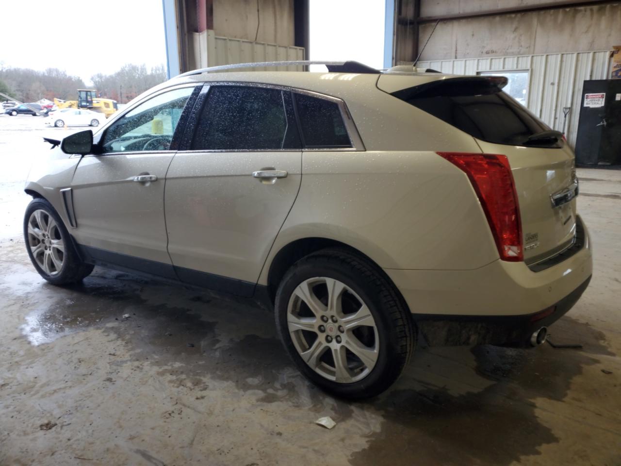 2015 Cadillac SRX VIN 3GYFNDE35FS571811 Copart auction photo, front end / side damage thumbnail 2