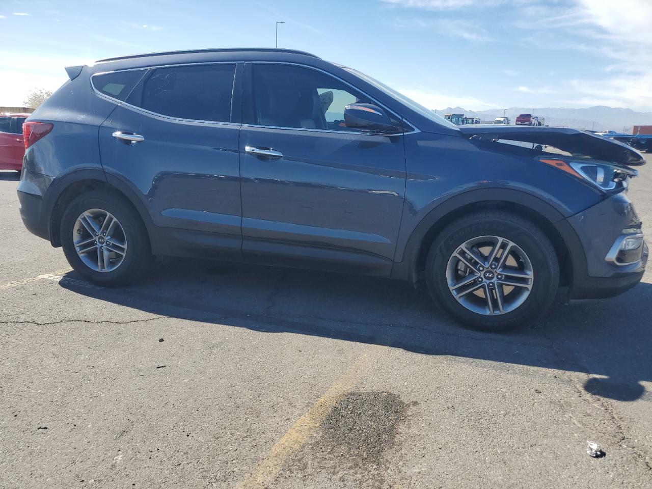 2017 Hyundai Santa Fe VIN 5NMZUDLB2HH014705 Copart auction photo, front end damage thumbnail 4