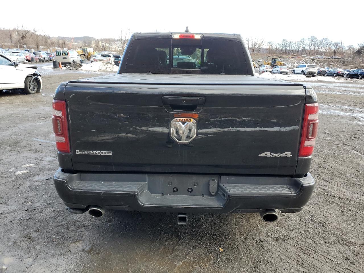 2021 RAM 1500 VIN 1C6SRFJT7MN547616 Copart auction photo, undercarriage / minor dent/scratches damage thumbnail 6