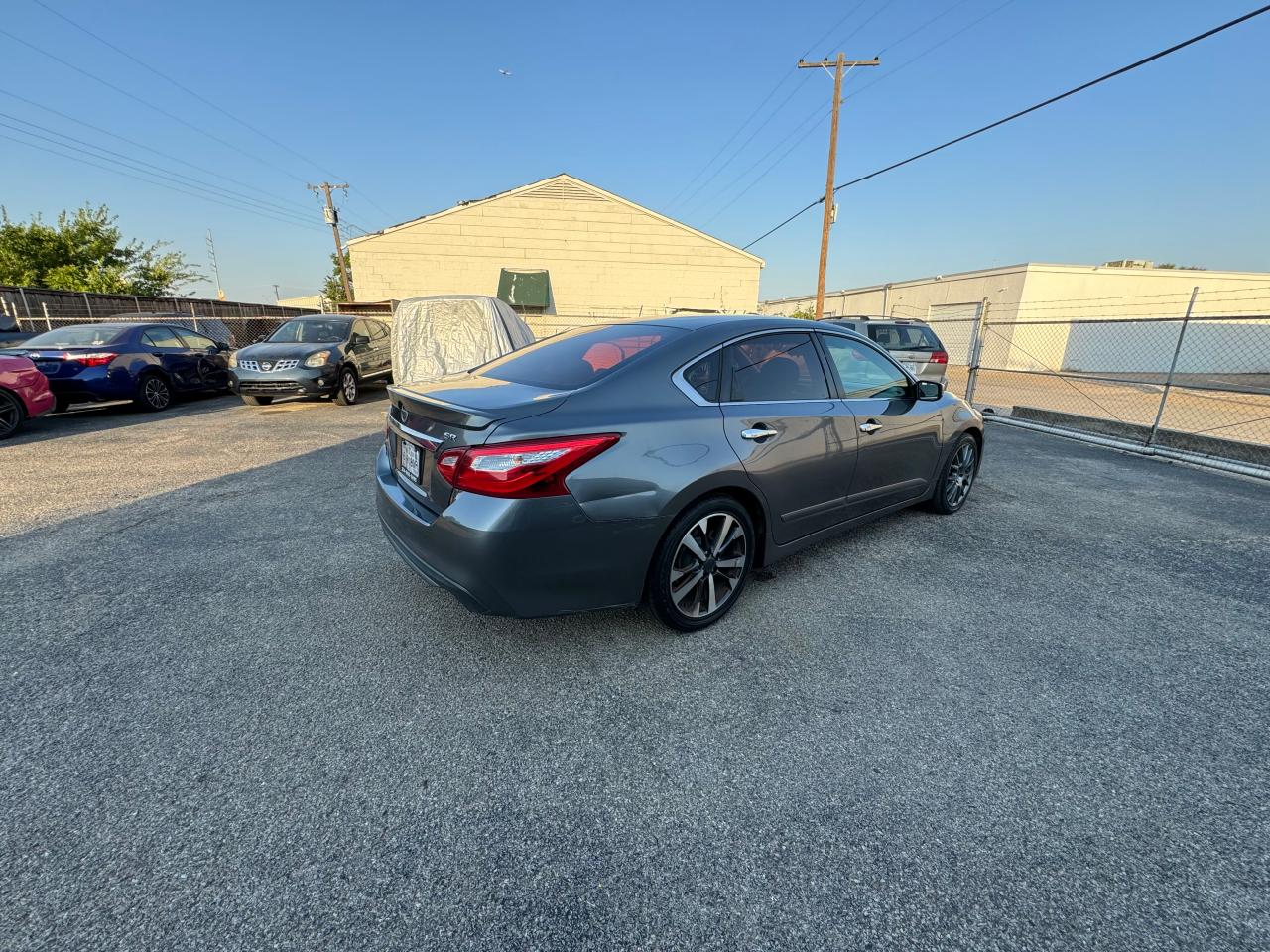 2016 Nissan Altima VIN 1N4AL3AP7GC175529 Copart auction photo, normal wear / minor dent/scratches damage thumbnail 4