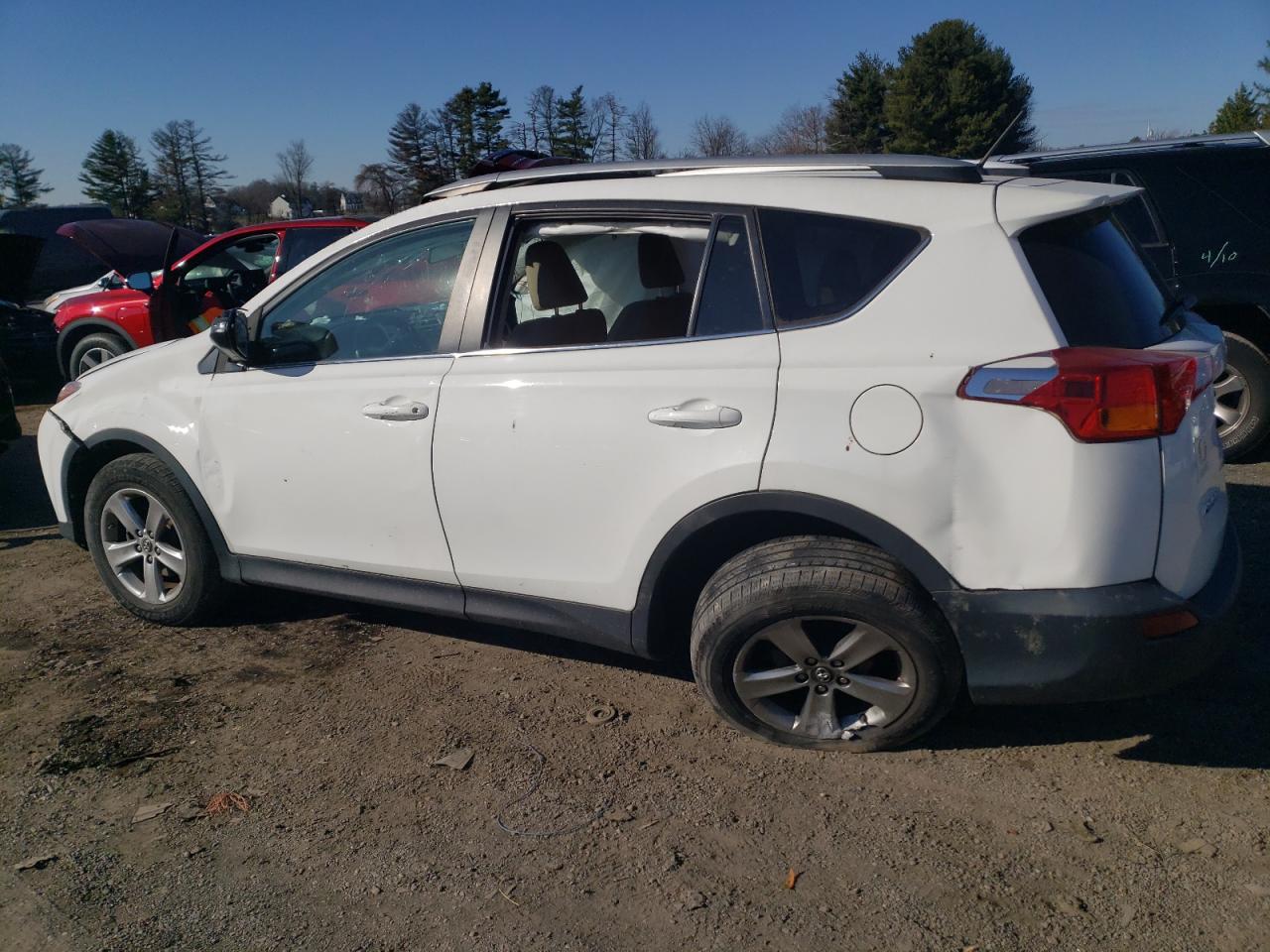 2015 Toyota RAV 4 VIN 2T3RFREV3FW345283 Copart auction photo, rollover / side damage thumbnail 2