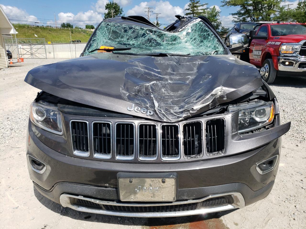 2014 Jeep Grand Cherokee VIN 1C4RJFBG3EC325491 Copart auction photo, all over damage thumbnail 5
