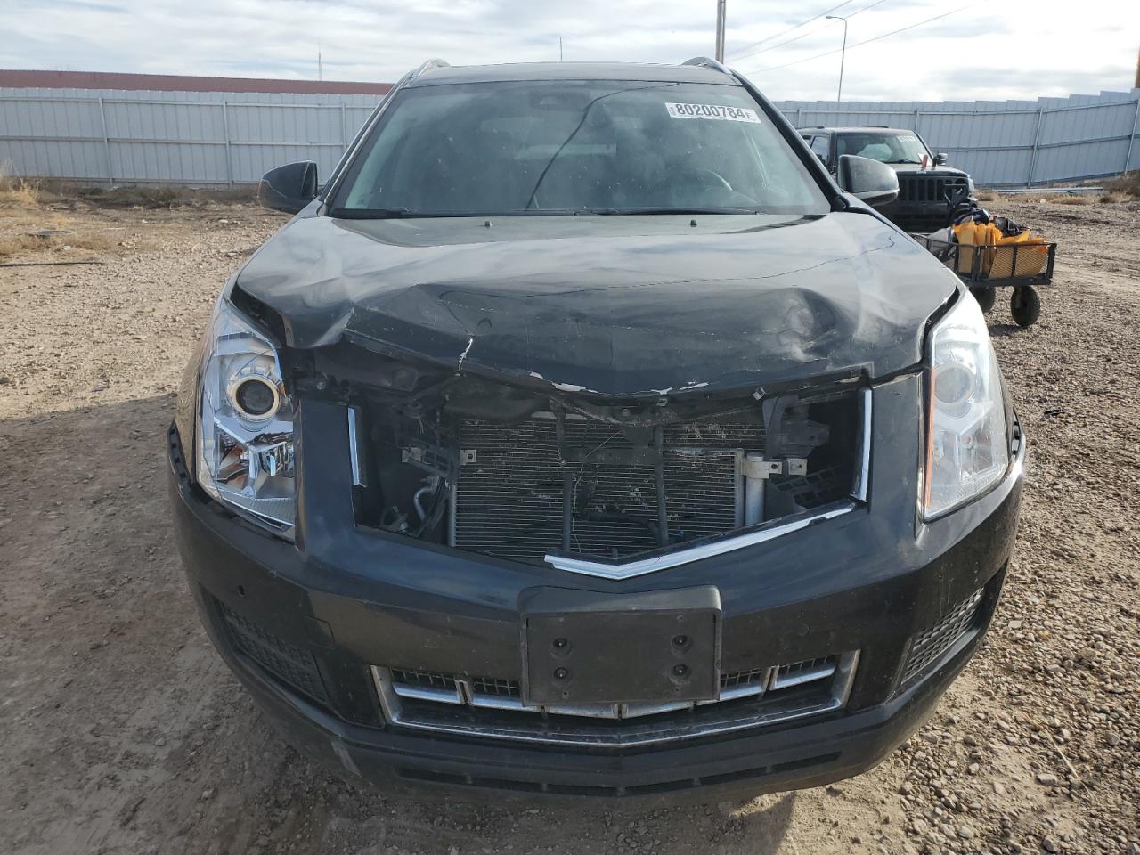 2016 Cadillac SRX VIN 3GYFNEE30GS562635 Copart auction photo, front end damage thumbnail 5
