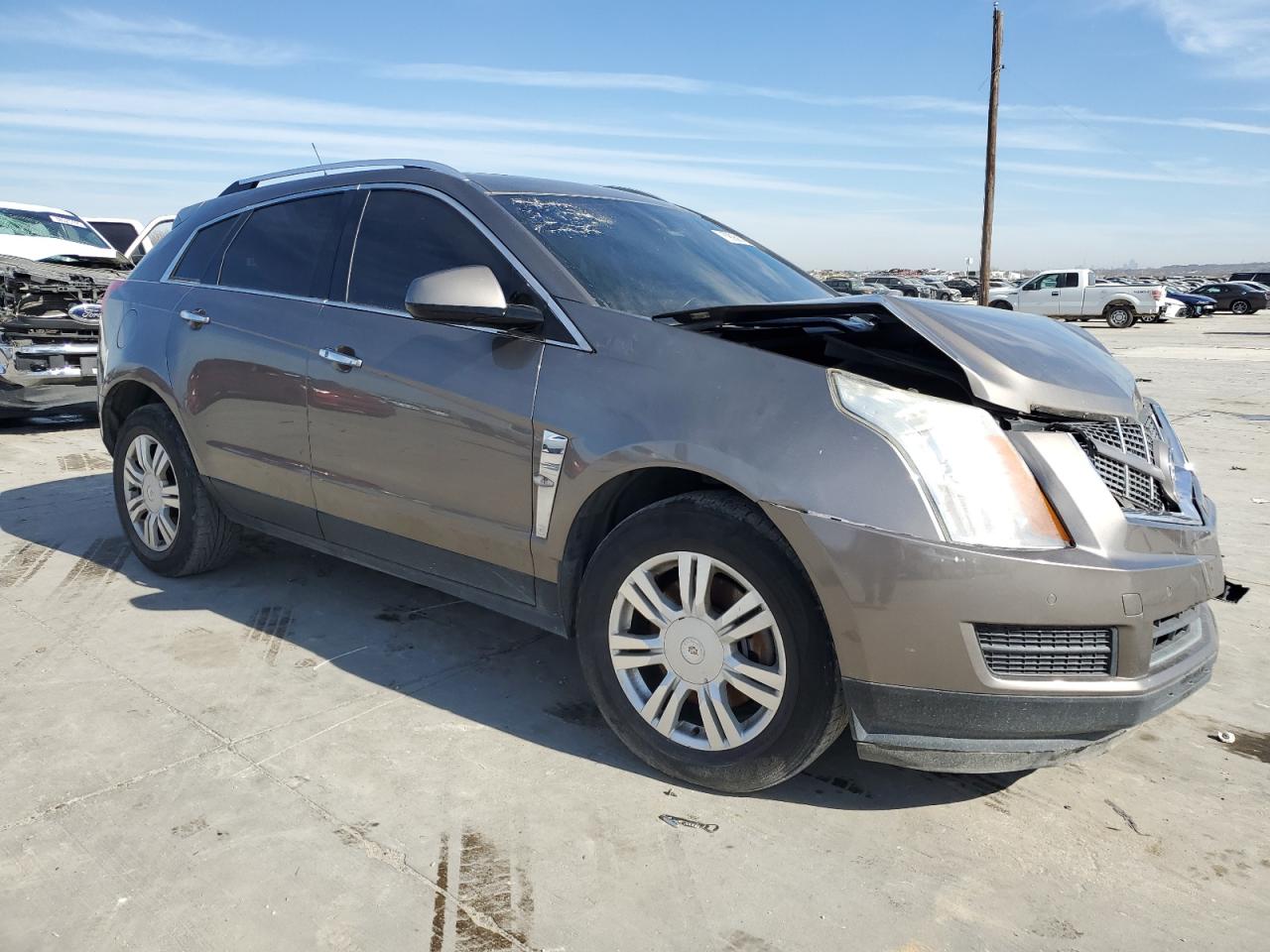 2012 Cadillac SRX VIN 3GYFNDE35CS529960 Copart auction photo, front end damage thumbnail 4