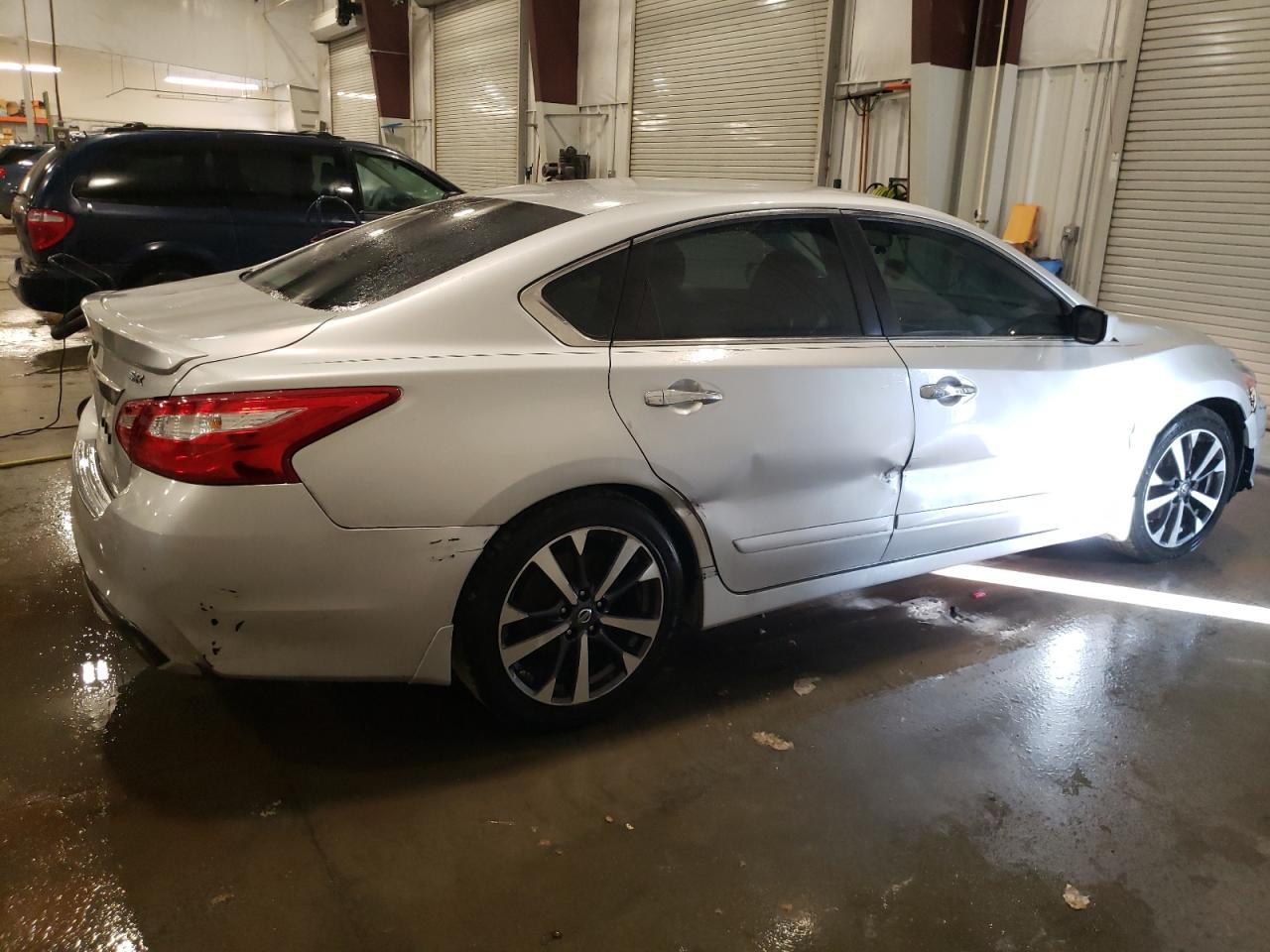 2016 Nissan Altima VIN 1N4AL3AP0GC187148 Copart auction photo, undercarriage / all over damage thumbnail 3