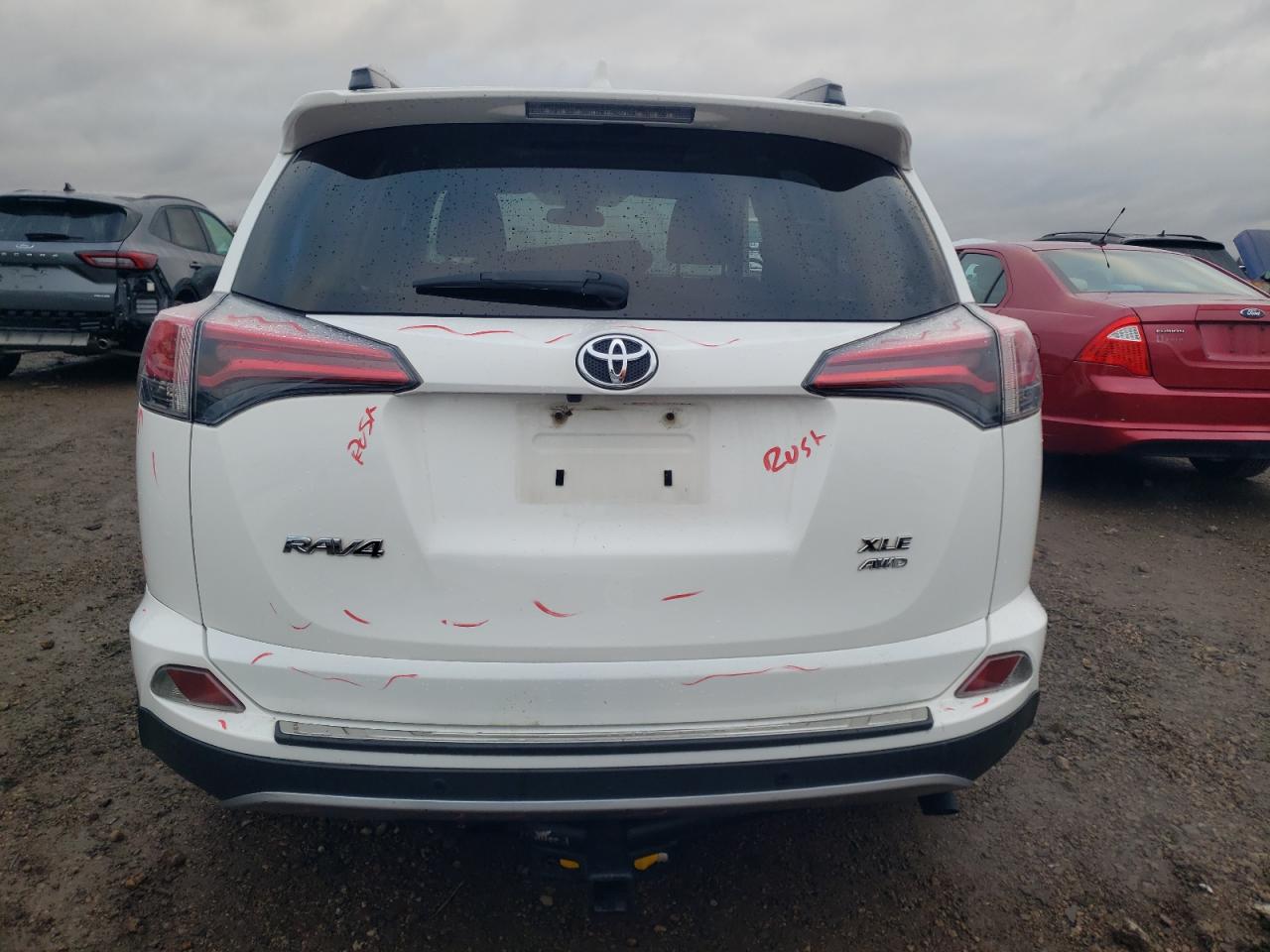 2017 Toyota RAV 4 VIN JTMRFREV0HJ703800 Copart auction photo, side / front end damage thumbnail 6