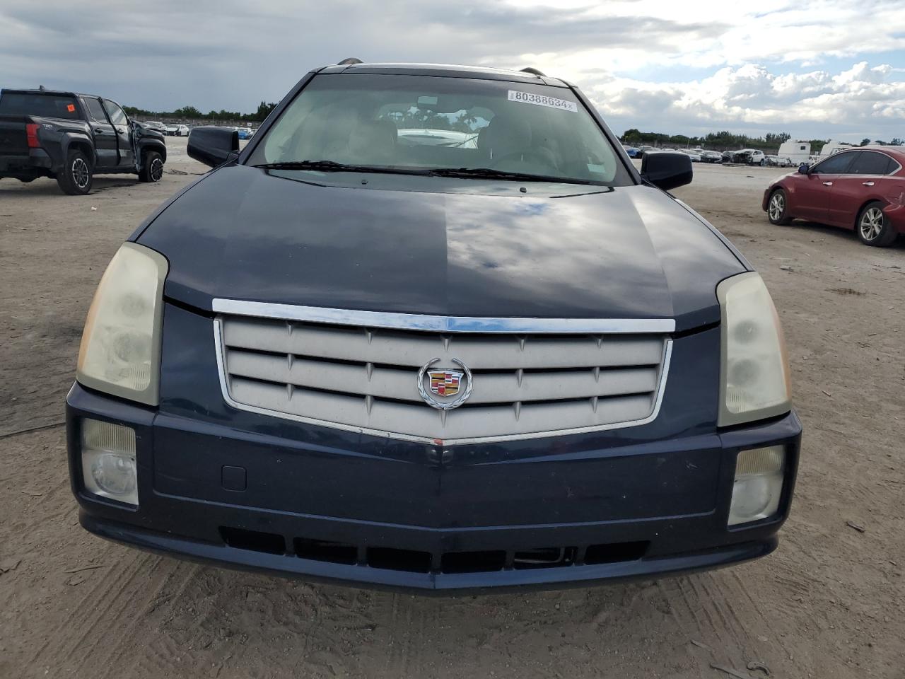 2008 Cadillac SRX VIN 1GYEE637580146953 Copart auction photo, minor dent/scratches damage thumbnail 5
