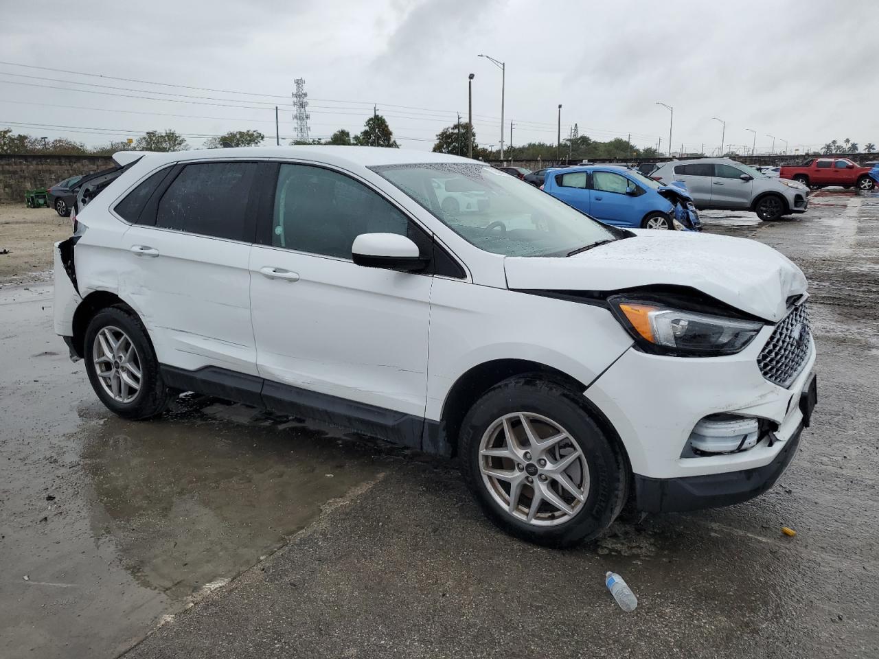 2023 Ford Edge VIN 2FMPK4J90PBA36451 Copart auction photo, front end / rear end damage thumbnail 4