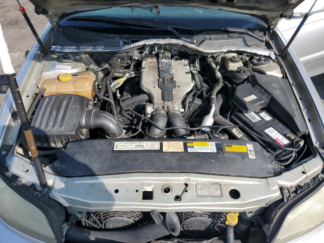 2000 Cadillac Catera VIN W06VR54R1YR003905 Copart auction photo, burn - engine / minor dent/scratches damage thumbnail 11