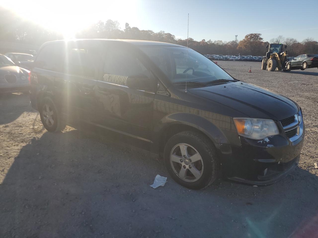 2012 Dodge Caravan VIN 2C4RDGDG0CR100699 Copart auction photo, all over / minor dent/scratches damage thumbnail 4