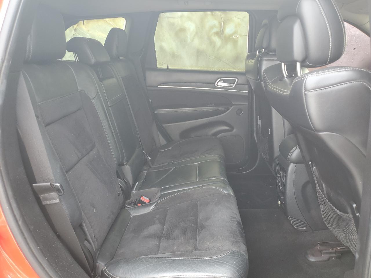 2012 Jeep Grand Cherokee VIN 1C4RJFDJ7CC217641 Copart auction photo, burn damage thumbnail 11