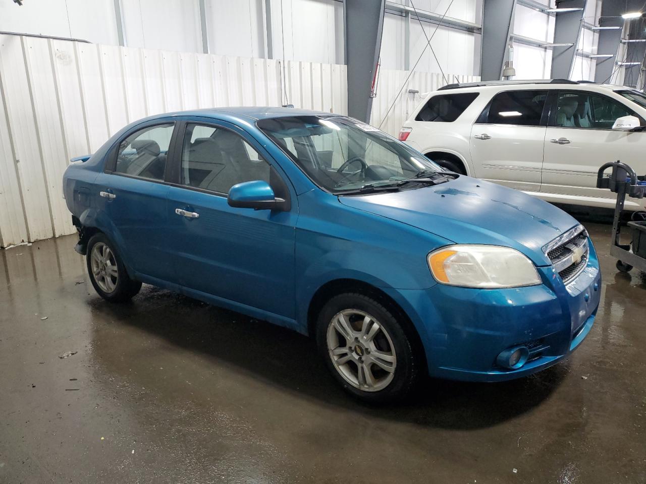2009 Chevrolet Aveo VIN KL1TG56E19B303113 Copart auction photo, rear end / hail damage thumbnail 4
