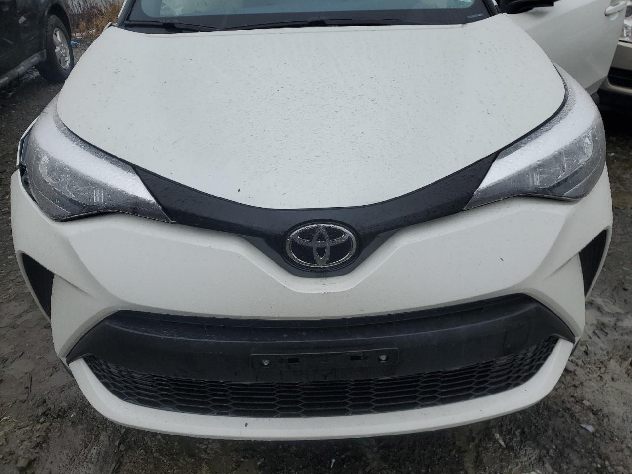2021 Toyota C-HR VIN JTNKHMBX5M1107124 Copart auction photo, side damage thumbnail 12