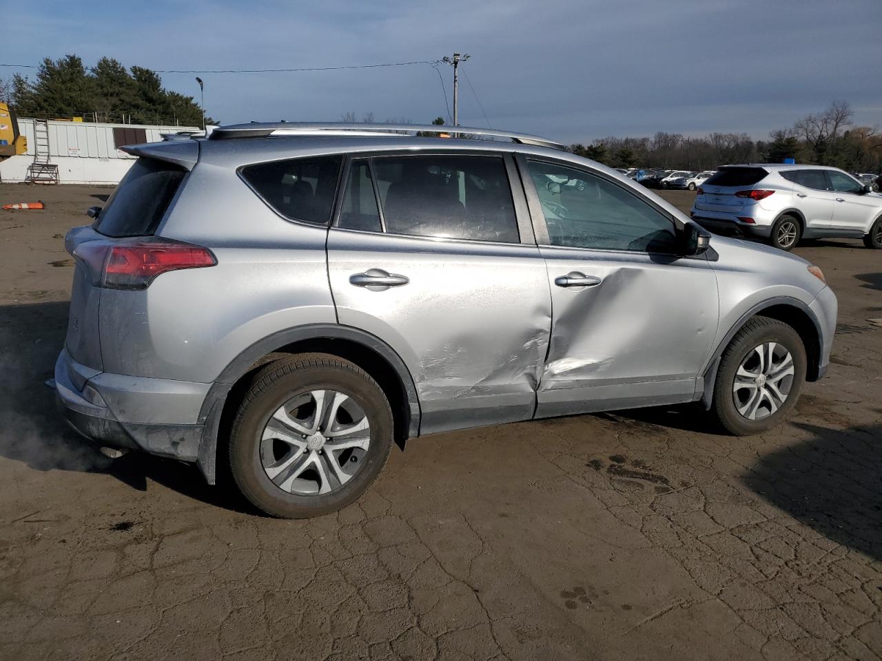 2016 Toyota RAV 4 VIN 2T3BFREV1GW509973 Copart auction photo, side damage thumbnail 3