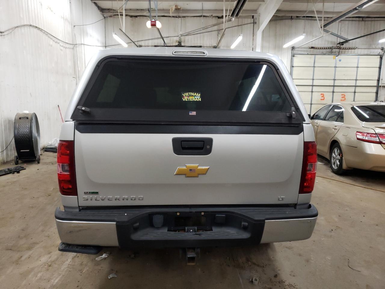 2011 Chevrolet Silverado VIN 1GCRKSE32BZ423127 Copart auction photo, front end / side damage thumbnail 6
