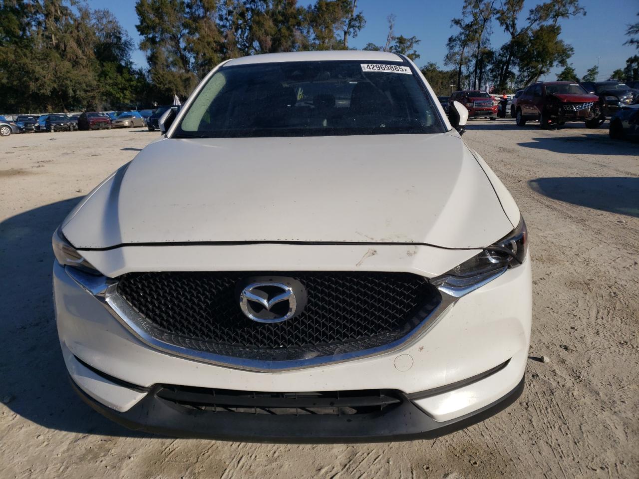 2019 Mazda CX-5 VIN JM3KFABM0K0581670 Copart auction photo, rear end / minor dent/scratches damage thumbnail 5