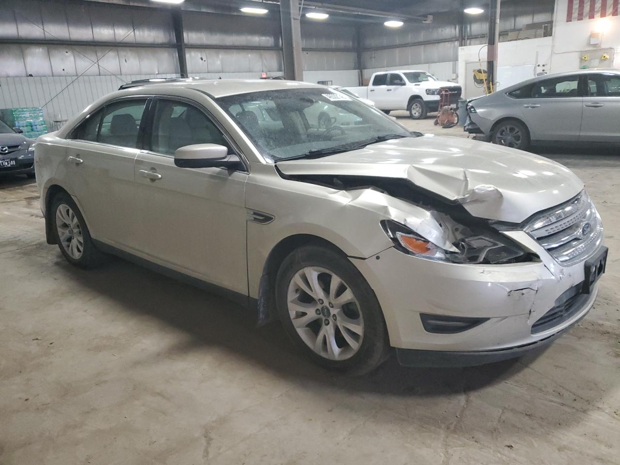 2011 Ford Taurus VIN 1FAHP2EW2BG129431 Copart auction photo, front end / minor dent/scratches damage thumbnail 4
